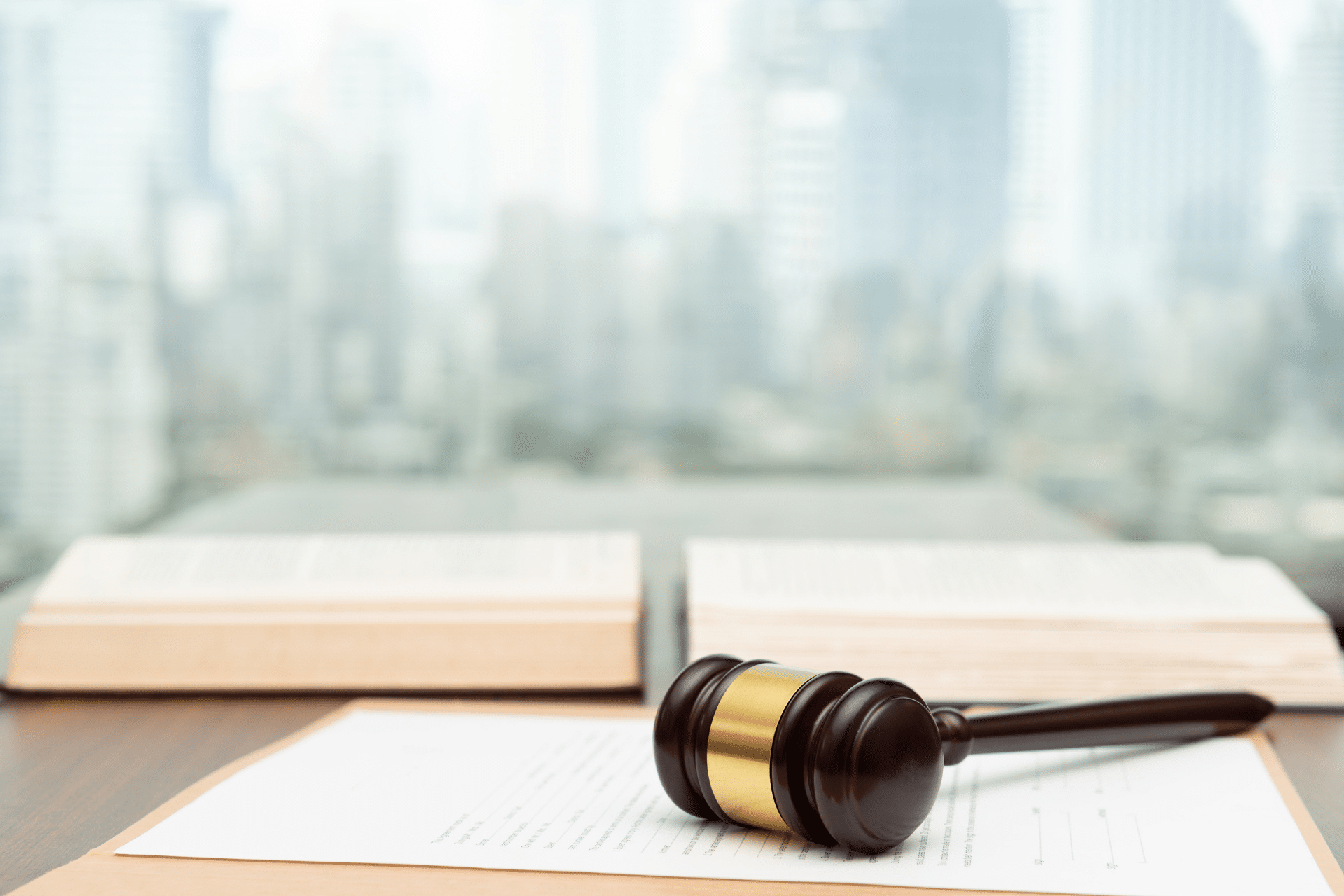 legal gavel on a desk with an open book