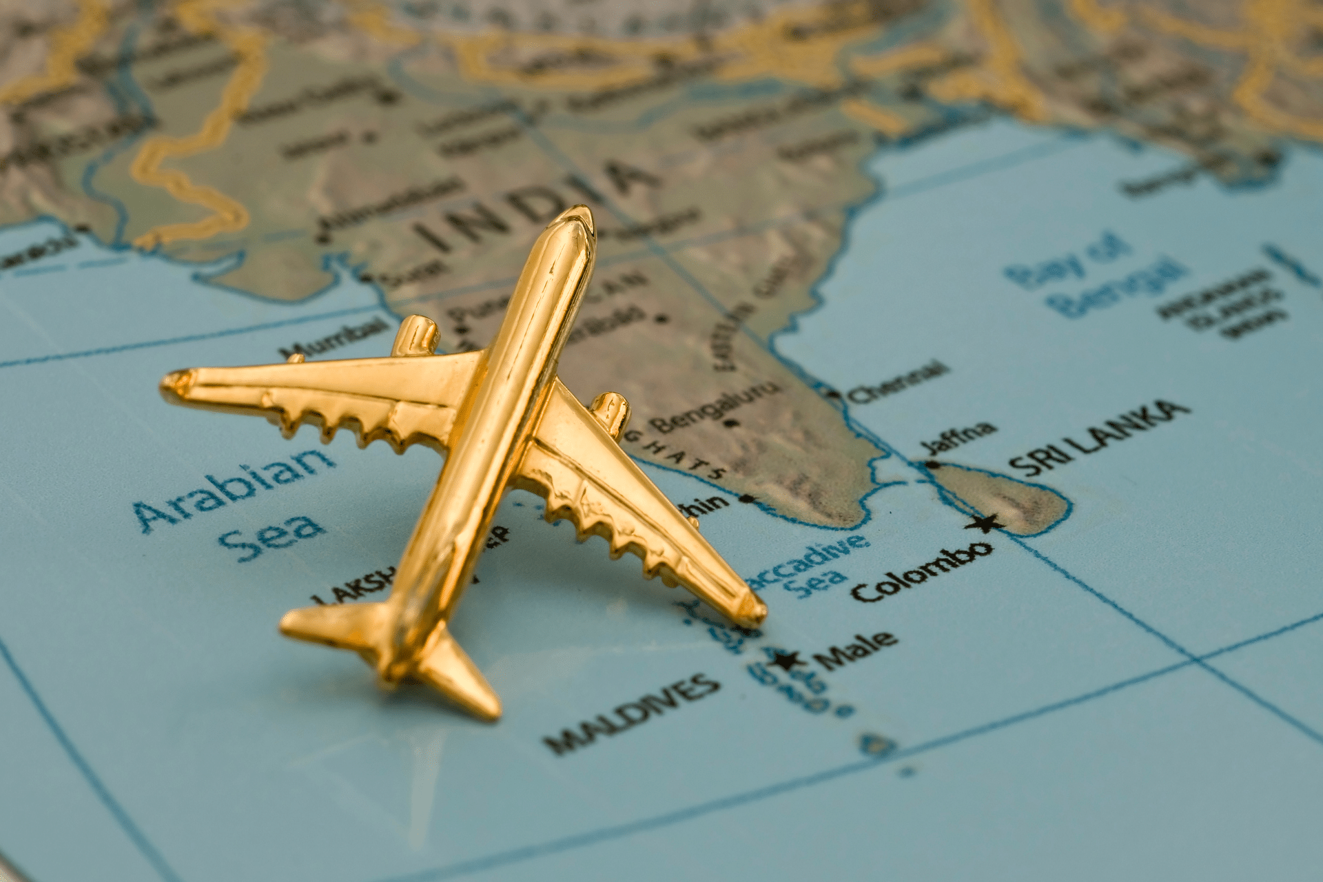 toy airplane on map of India