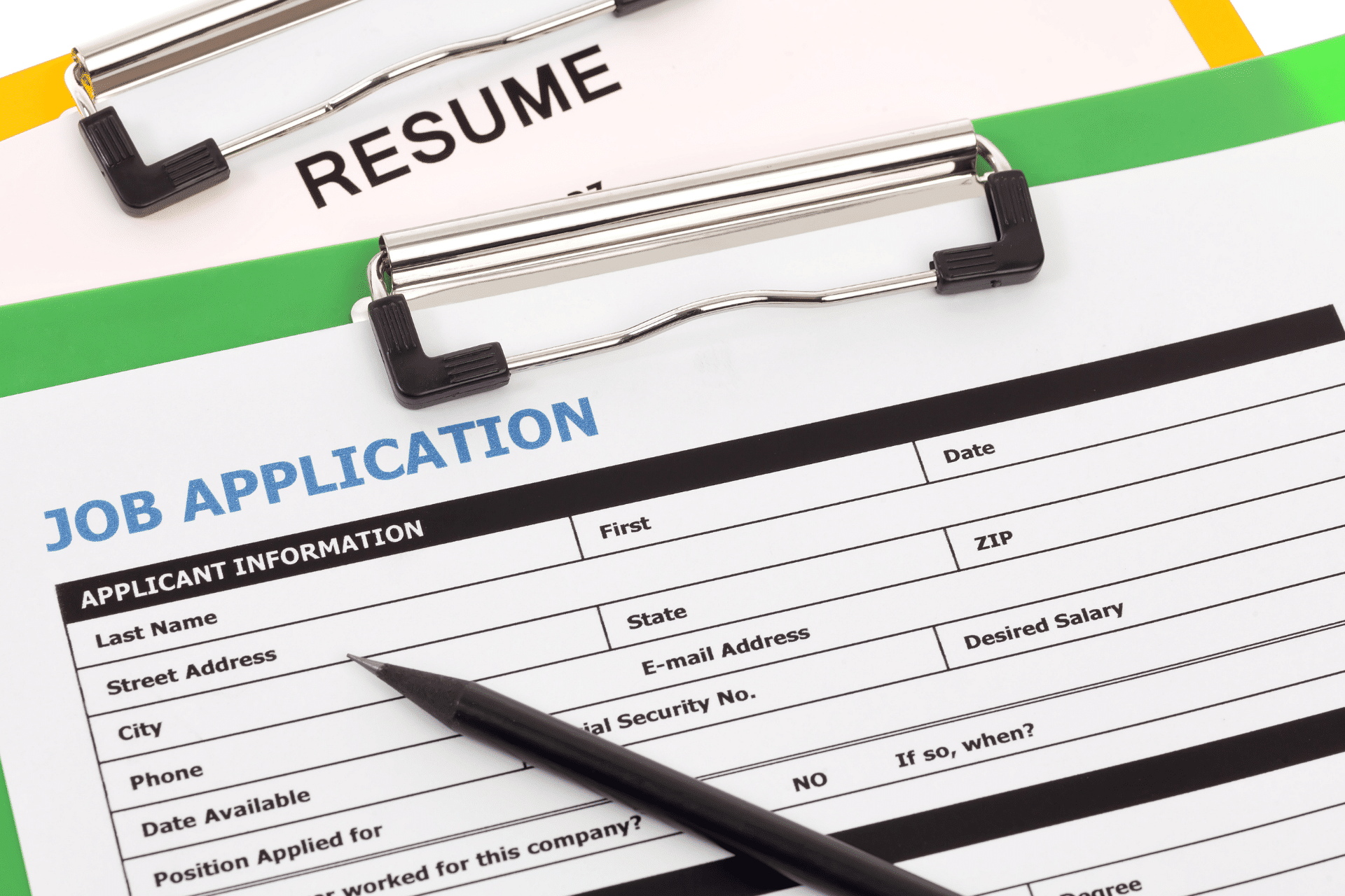 job application and resume on a table